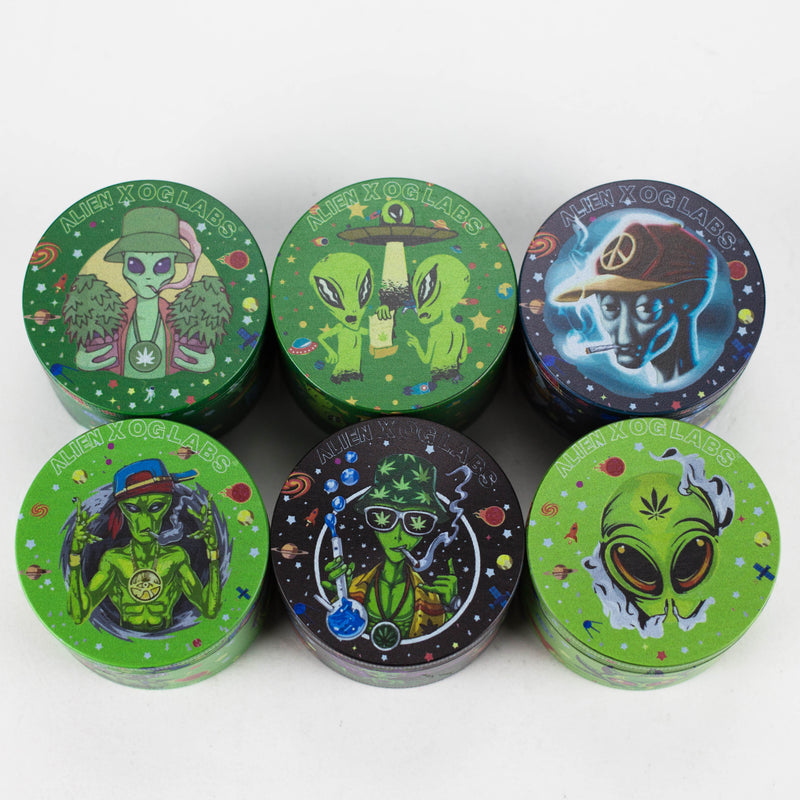 O 4 Layes 63mm Alien assorted Design Metal Grinder Box of 6 [SMKZ-001]